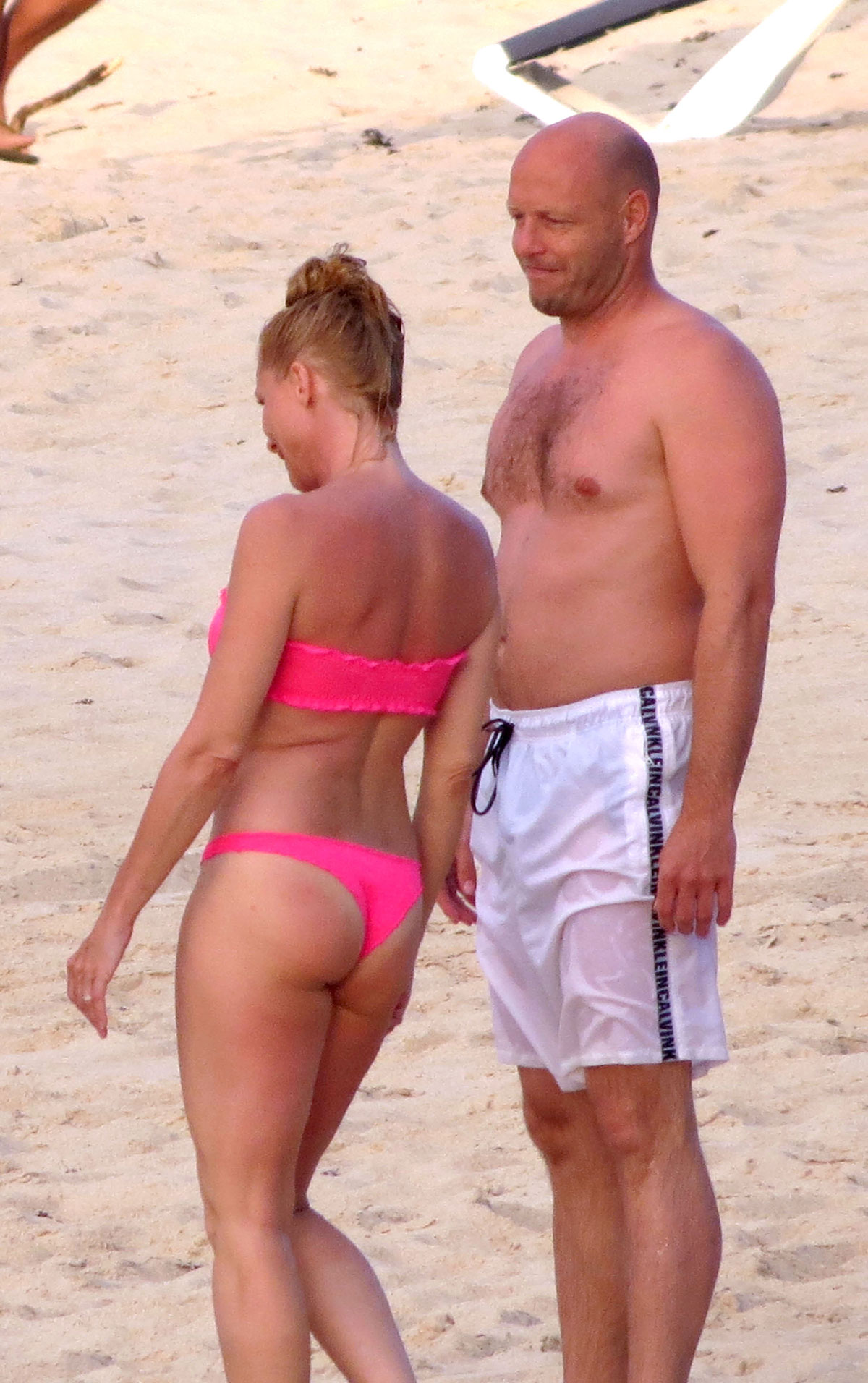 Nicolette Sheridan wear pink thong bikini at the Beach in St. Barts
